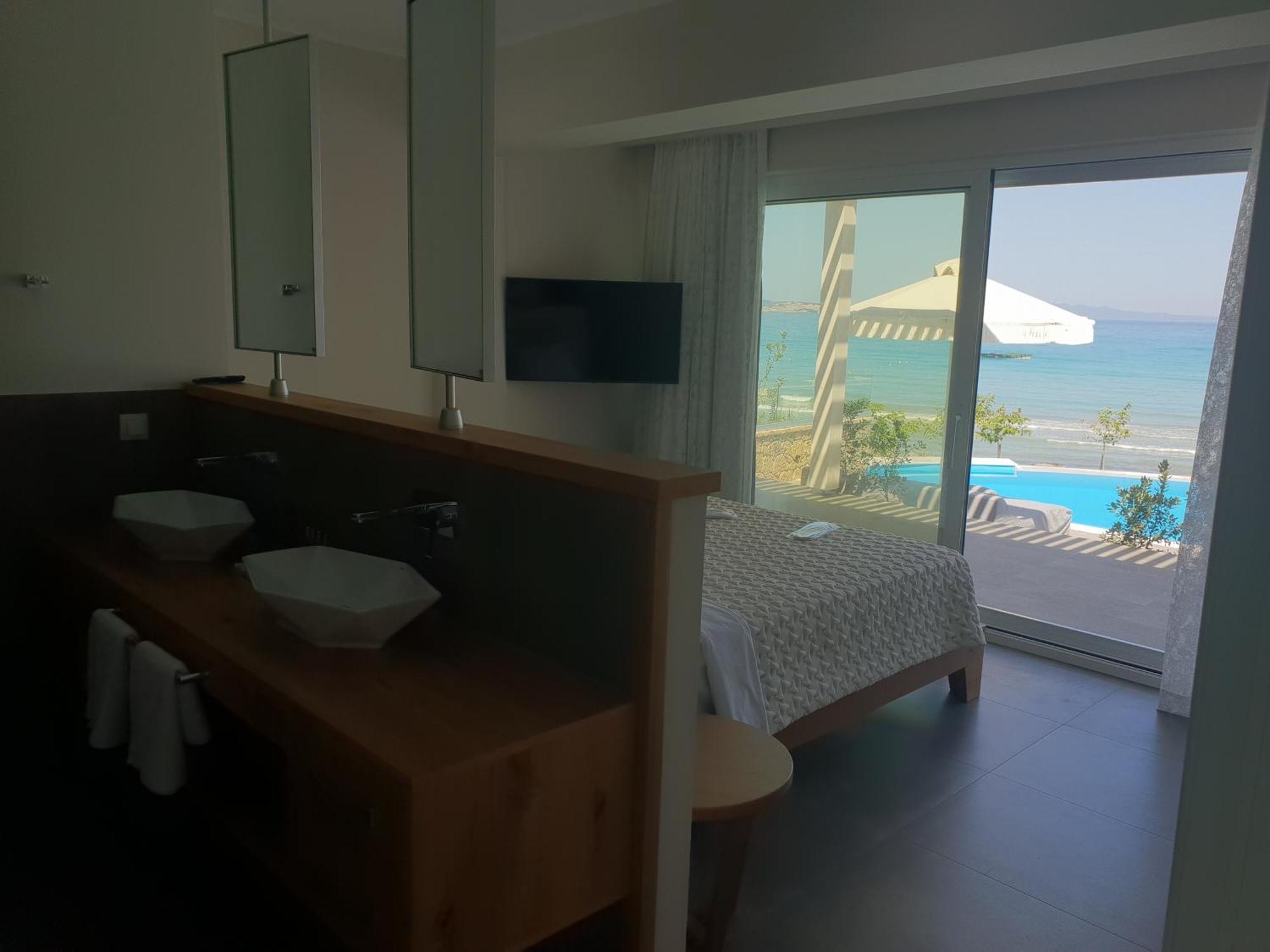 Paralia Luxury Suites Agios Stefanos Avliotes  Exteriör bild