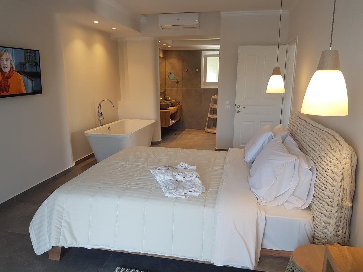 Paralia Luxury Suites Agios Stefanos Avliotes  Exteriör bild